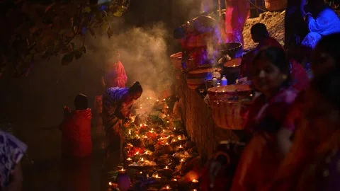 View of people performing religious rituals with oil lamps, Bangladesh. Video stock 334990719