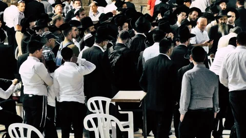 View of people praying front the wailing wall in Jerusalem Stock Footage 91142275