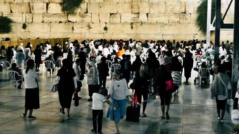View of people praying front the wailing wall in Jerusalem Stock Footage 91144261