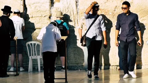 View of people praying front the wailing wall in Jerusalem Stock Footage 91145614