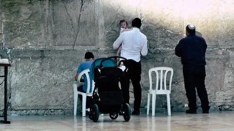 View of people praying front the wailing wall in Jerusalem Stock Footage 91164702
