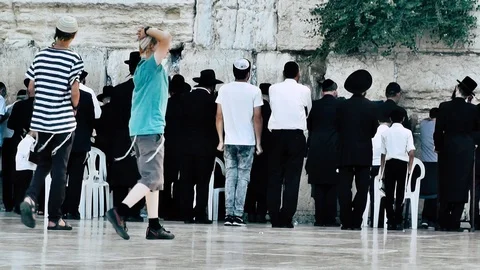 View of people praying front the wailing wall in Jerusalem Stock Footage 91164991