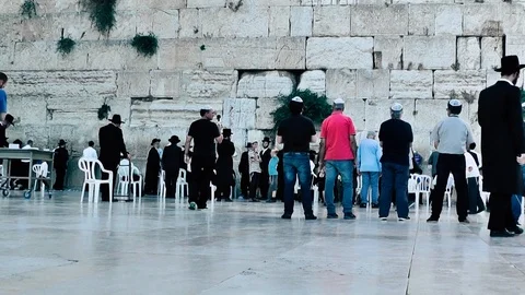 View of people praying front the wailing wall in Jerusalem Stock Footage 91197586