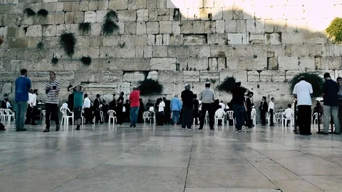View of people praying front the wailing wall in Jerusalem Stock Footage 91197597