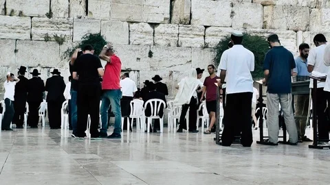 View of people praying front the wailing wall in Jerusalem Stock Footage 91197626