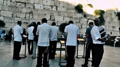 View of people praying front the wailing wall in Jerusalem Stock Footage 91197684
