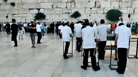 View of people praying front the wailing wall in Jerusalem Stock Footage 91197749