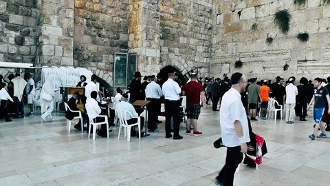 View of people praying front the wailing wall in Jerusalem Stock Footage 91198527