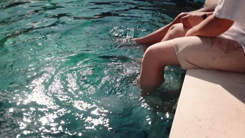 View of people relaxing by a swimming pool in Samana, Dominican Republic. Video stock 340641884