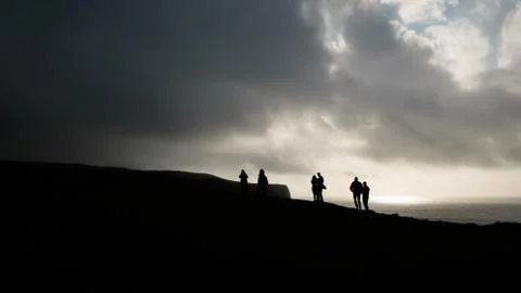 View on People Silhoette at Cliffs of Moher - Ireland Stock Photos