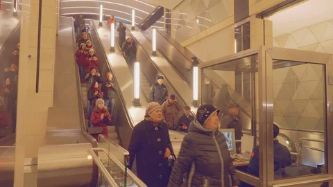 View of people using escalator in new metro station Stock Footage 89883860