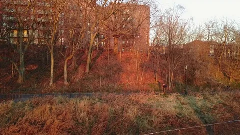 View of People Walking up a Slope Stock Footage