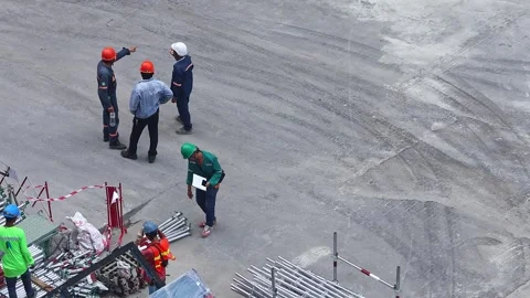 View of people working on a construction site of a skyscraper. Stock Footage 283944563