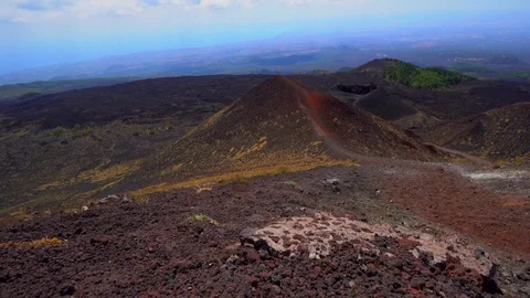 View of the petrified lava flow at the slopes of the volcano Etna, Italy. Stock Footage 93396760