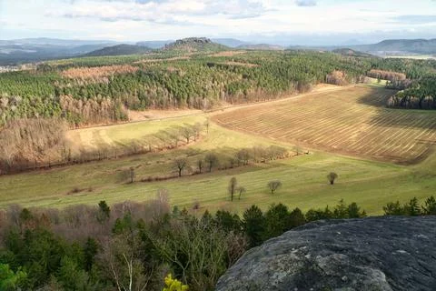 View from the Pfaffenstein. Forests, mountains, fields, vastness, panorama. Stock Photos