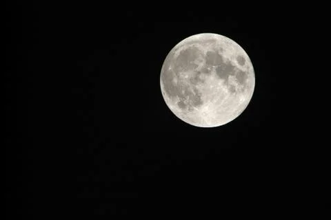 View, of a phase, of the lunar eclipse through a telephoto lens in Turin, Ita Stock Photos