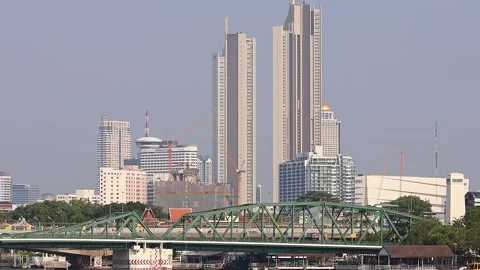 View of Phra Phutthayotfa Bridge and skyscrapers in Bangkok. Stock Footage 277562555