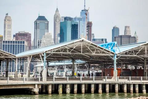 View of pier 2 in Brooklyn with unrecognizable people playing basketball Stock Photos