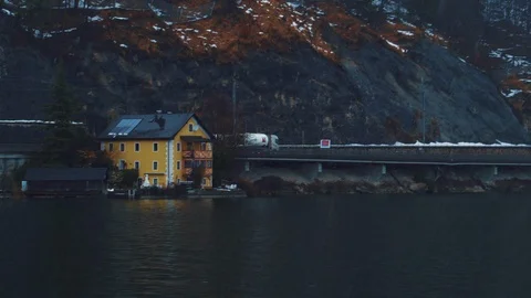 View from the pier of the lake to the mountains in the thick fog Stock Footage 105686213