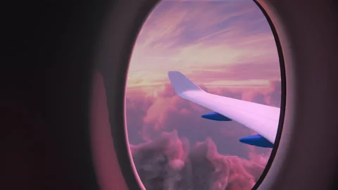 A View Of A Pink Sky From An Airplane Stock Footage 203695317