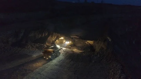 View of a pit on extraction of ore, work, a night shift Stock-Footage 96477192