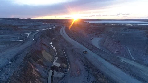 View of a pit on extraction of ore, work of trucks and an ekskvator Video stock 96486754