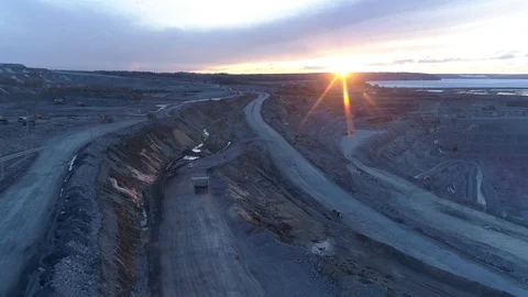 View of a pit on extraction of ore, work of trucks and an ekskvator Video stock 96486963