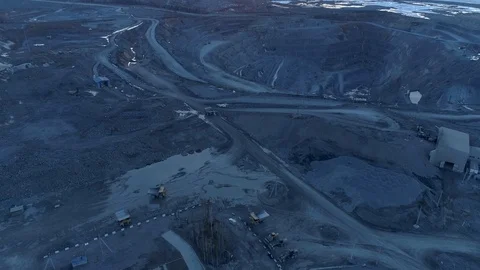 View of a pit on extraction of ore, work of trucks and an ekskvator Video stock 96486977