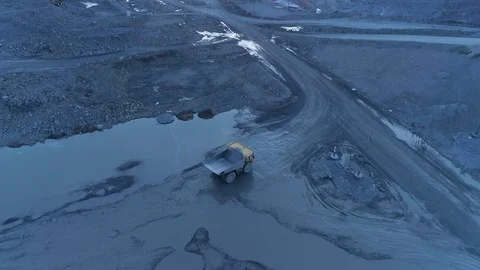 View of a pit on extraction of ore, work of trucks and an ekskvator Video stock 96487355