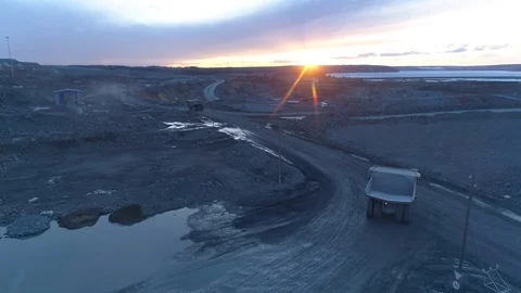 View of a pit on extraction of ore, work of trucks and an ekskvator Video stock 96487449