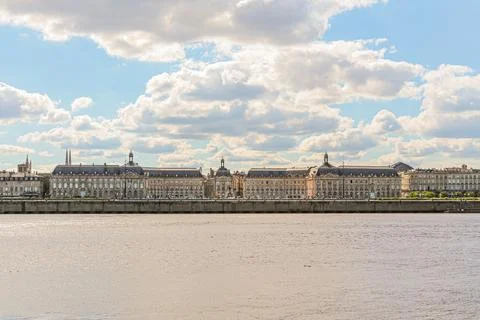 A view of Place de la Bourse across the Goronne River in the city of Bordea.. Stock Photos