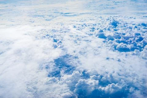 The view from the plane above the cloud and sky 写真素材