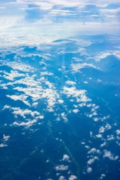 The view from the plane above the cloud and sky Stock Photos
