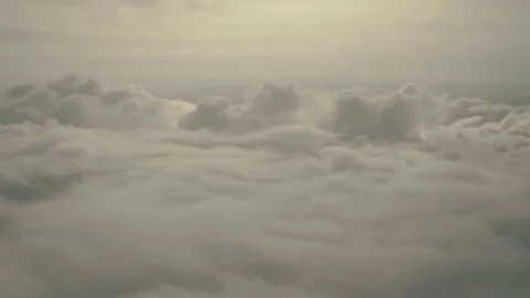 View from plane - beautiful white clouds Stock Footage 84581359