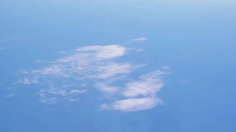 View from the plane to the blue sky with clouds Stock Footage 219474183