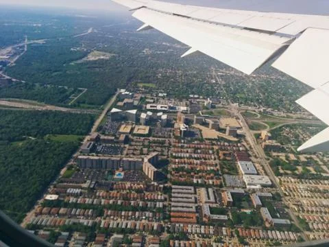 View from the plane to the city Stock Photos