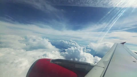 View From The Plane Flying Over The Clouds Vídeo Stock 286357914