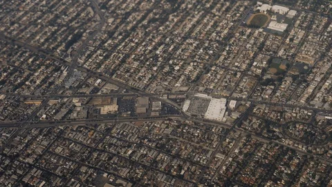 View From Plane Flying Over Residential Areas And Highway Of Los Angeles Stock Footage 126158527