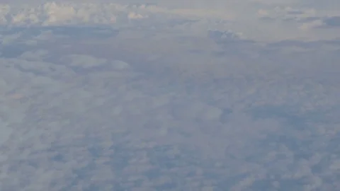 View from the plane to the sky and clouds during the flight. Stock Footage 82483263