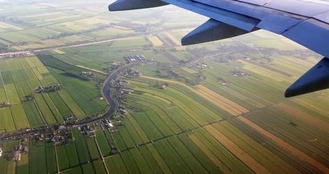 View from the plane to the spring fields. Stock Photos