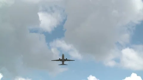 View of a plane taking off from below Stock Footage 158744983