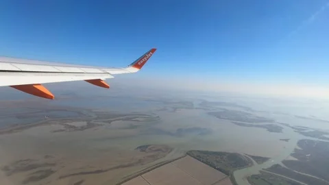 View From Plane Window On An Air Shuttle Flight Stock Footage 238632673