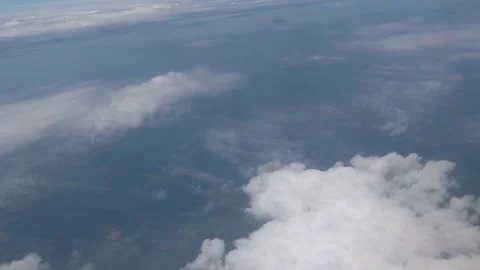 View from the plane window on the clouds Stock Footage 128742496