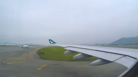 View from the plane window during takeoff in Hong Kong airport Stock Footage 115006823