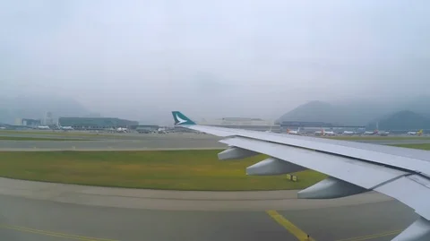 View from the plane window during takeoff in Hong Kong. Stock Footage 115006825
