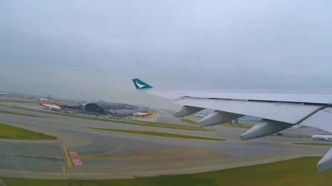 View from the plane window during takeoff in Hong Kong airport Видео 115006827