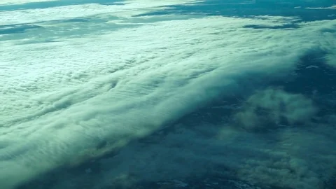 View from a plane window to the field of clouds. Stock Footage 125281488