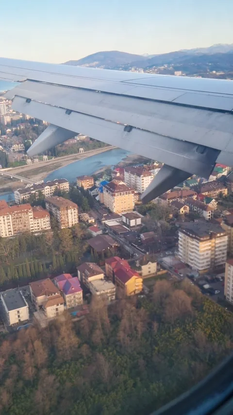 View from plane window flaps engaged on the wings during final approach Stock Footage 270052362