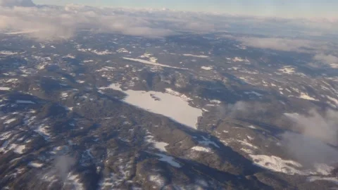 View from the Plane Window Flying Over Mountains 4k Stock Footage 238896965