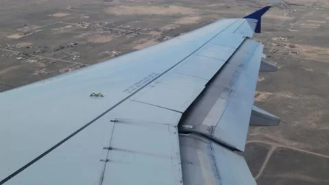 View from the plane window looking down Stock Footage 236428716